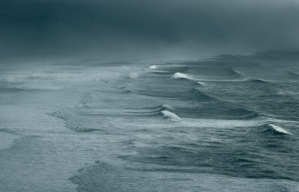 An Image of Waves Crashing to the Shore